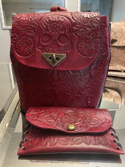 Hand Tooled Leather Backpack & Clutch