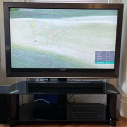 55” Sony TV + Glass TV Stand