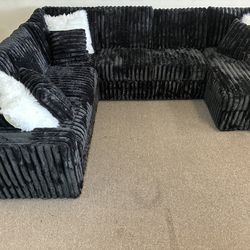 Sectional with pull out bed and storage