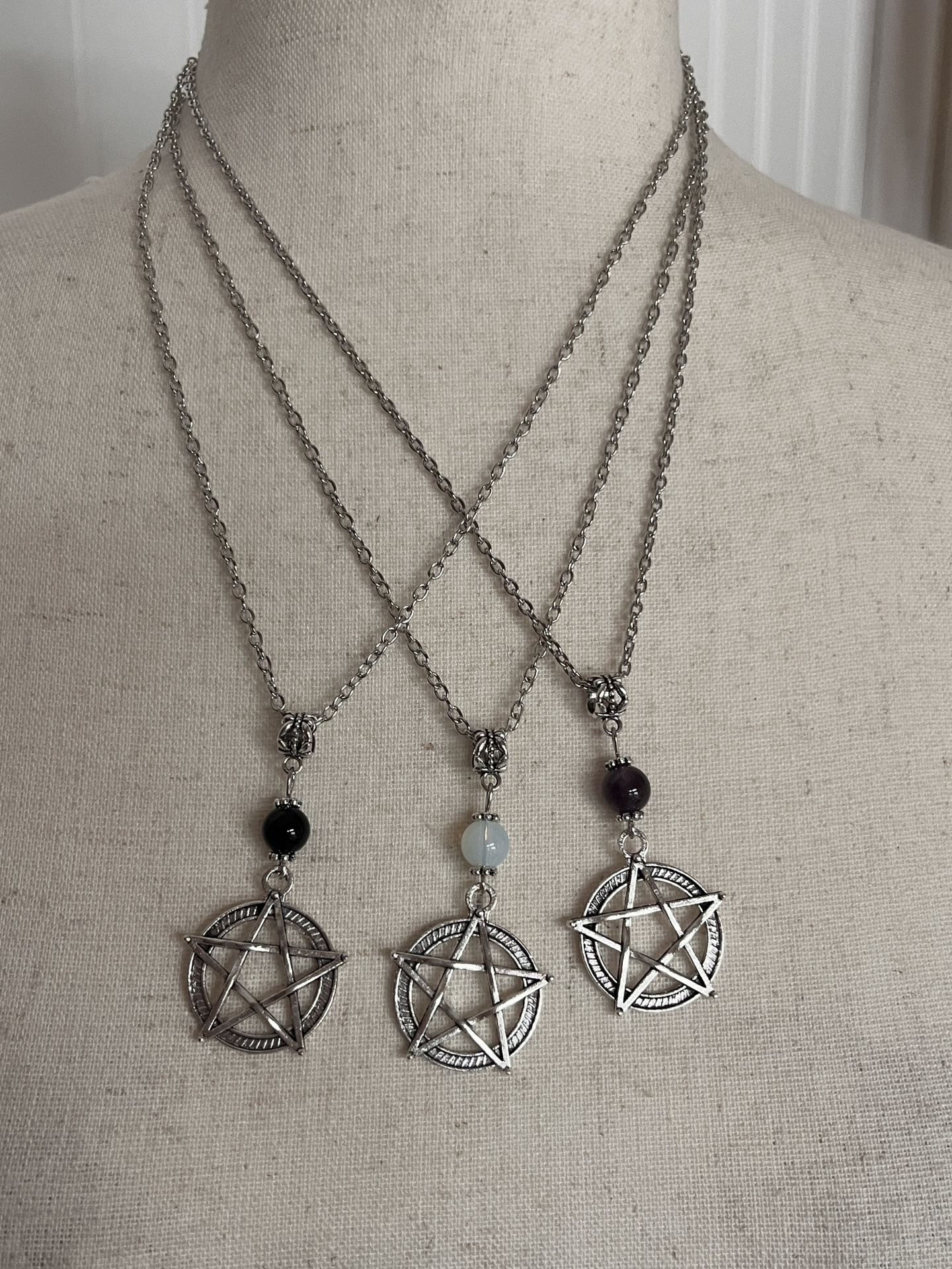 Wicca Moonstone Opalite, and a pentagram design. 