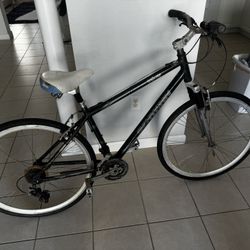 This is a project for you to finish; it is missing the chain and a few other details. The frame is aluminum, and it has good tires.