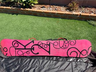 Pink Snowboard with Black Graphic Design