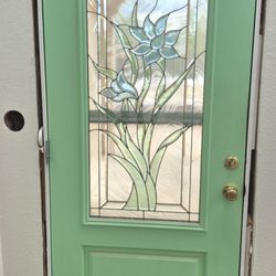 Solid wood and stained glass front door