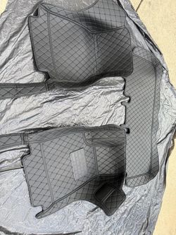 custom full-coverage diamond-quilted leather car floor mat set