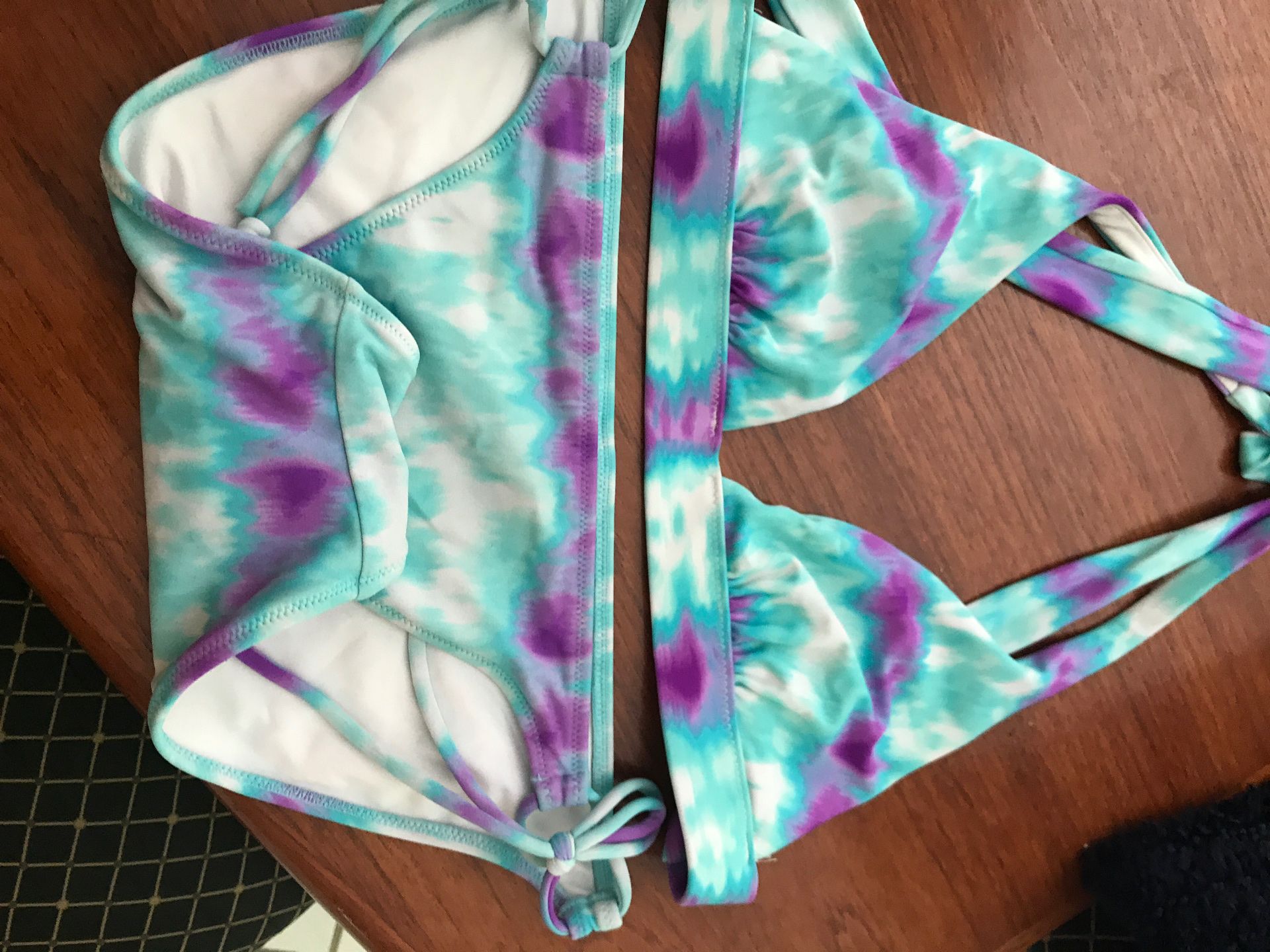 Girls or small women’s Bikini bathing suits.