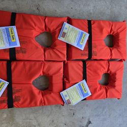 4 Life Jackets BRAND NEW 