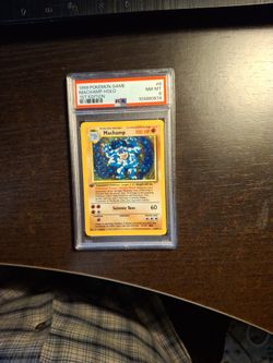 1999 Pokémon 1st Edition -  MACHAMP  -  PSA 8 Holo