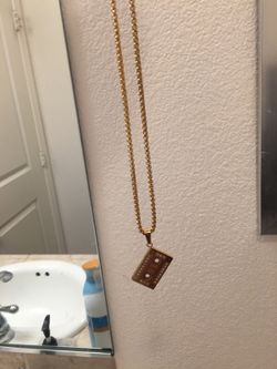 Gold tape chain and pendant