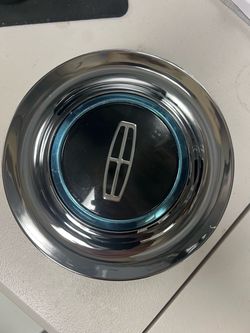 A set of Lincoln floating caps