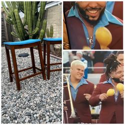 Title: Bad Bunny Super Bowl–Inspired Upcycled Wood Stools (Pair)  Description: These are a pair of upcycled real wood stools with a bold color combo i