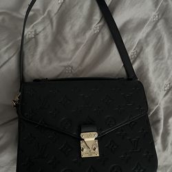 Black purse with strap