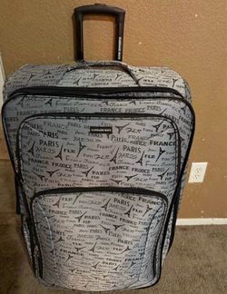 2 “luggage bags on wheels both used once the gray huge 40$ the medium 30$ price firm paid way more