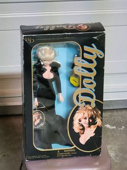 Dolly Parton doll in a display box.