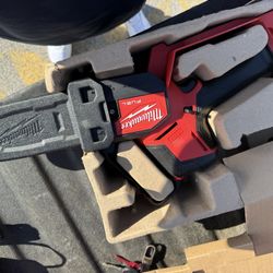 Milwaukee Hatchet/chainsaw