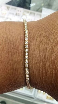 14k Gold tennis bracelets 3.50 ct vs si diamonds