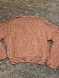 Light pink knitted sweater