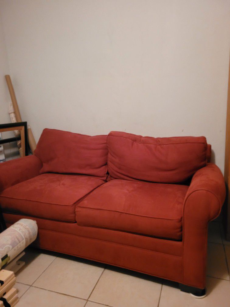 Deep seat pullout couch, reddish