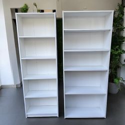  White large 5-layer bookcase $75, medium 5-layer bookcase $50,