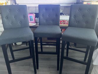 3 grey tall chairs