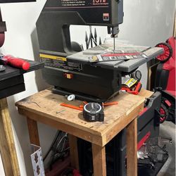 Bandsaw comes with table and manual