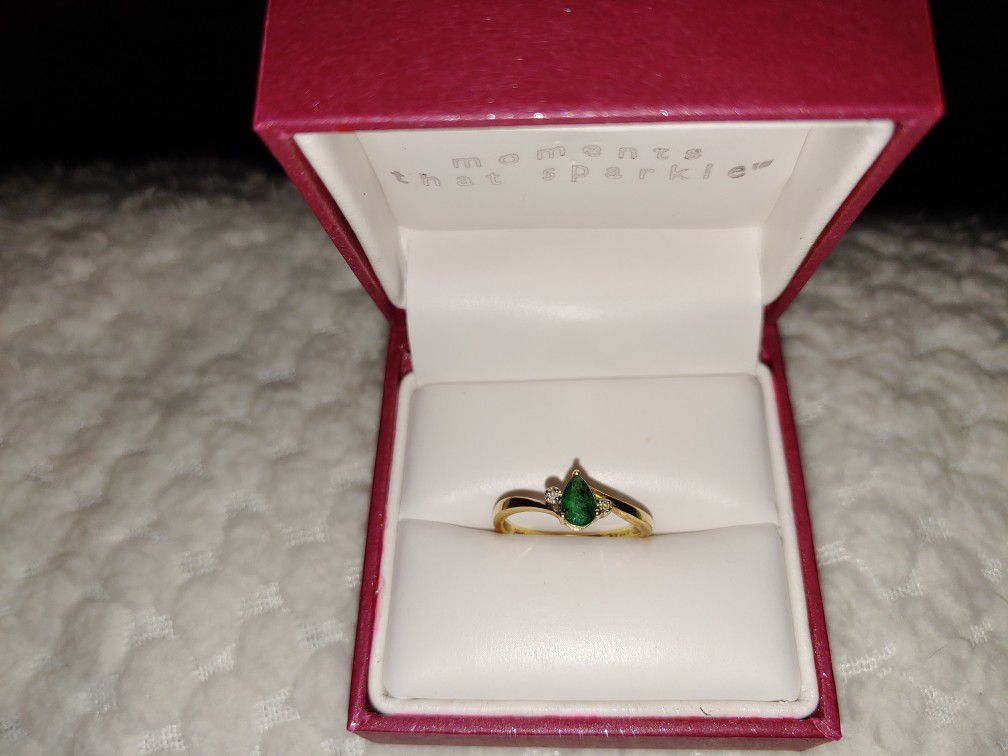 Genuine emerald and diamond ring