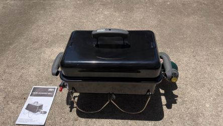 Portable Weber BBQ grill with replaceable cylinder fuel included