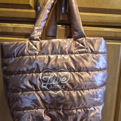 JUSTICE PUFFER BAG. NEW