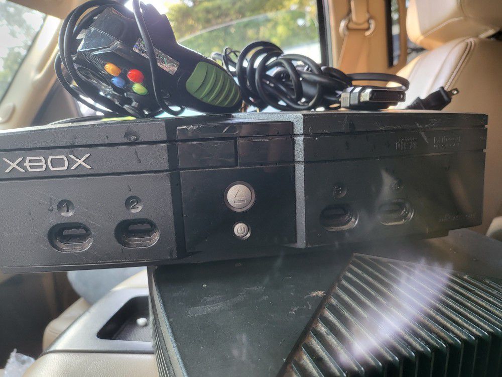 Original xbox system with controller and cords 
Cleaned tested and working perfectly in every way