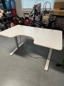 Adjustable electric assist height white desk