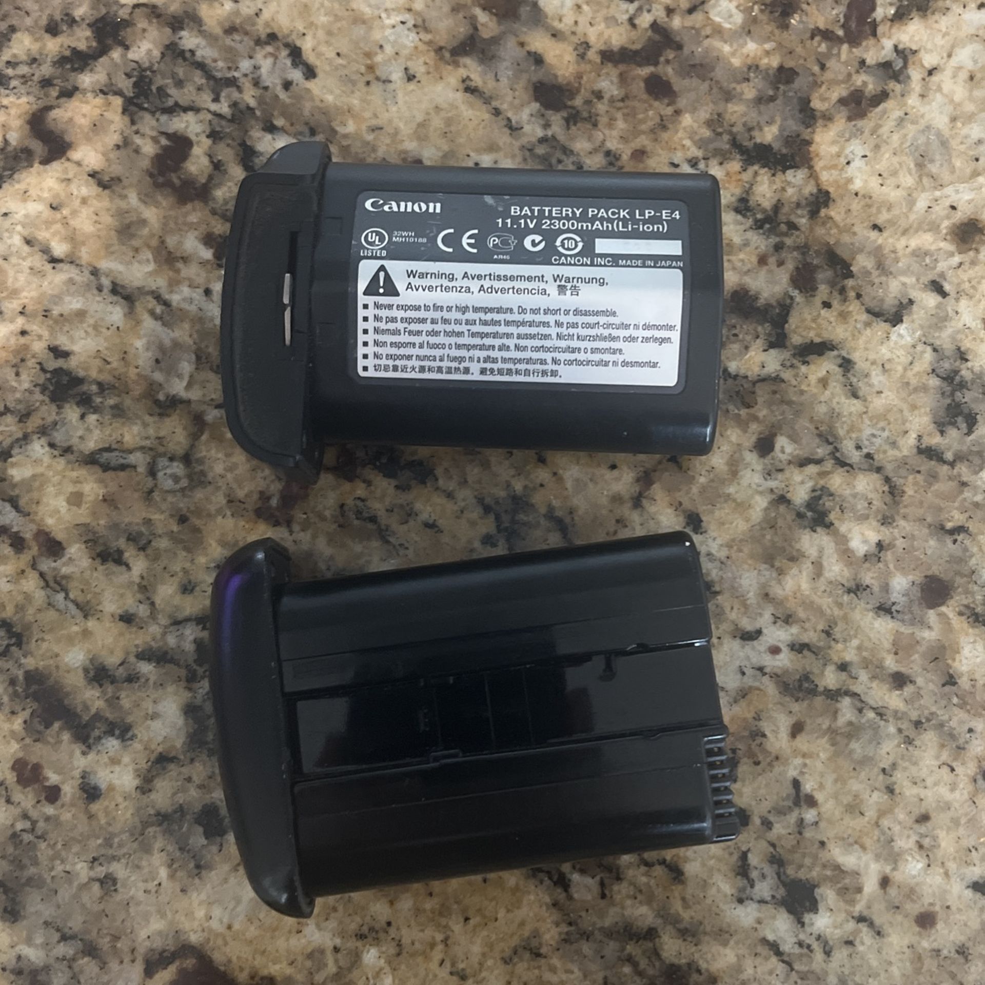 Two Canon Batteries Pack LP-E4