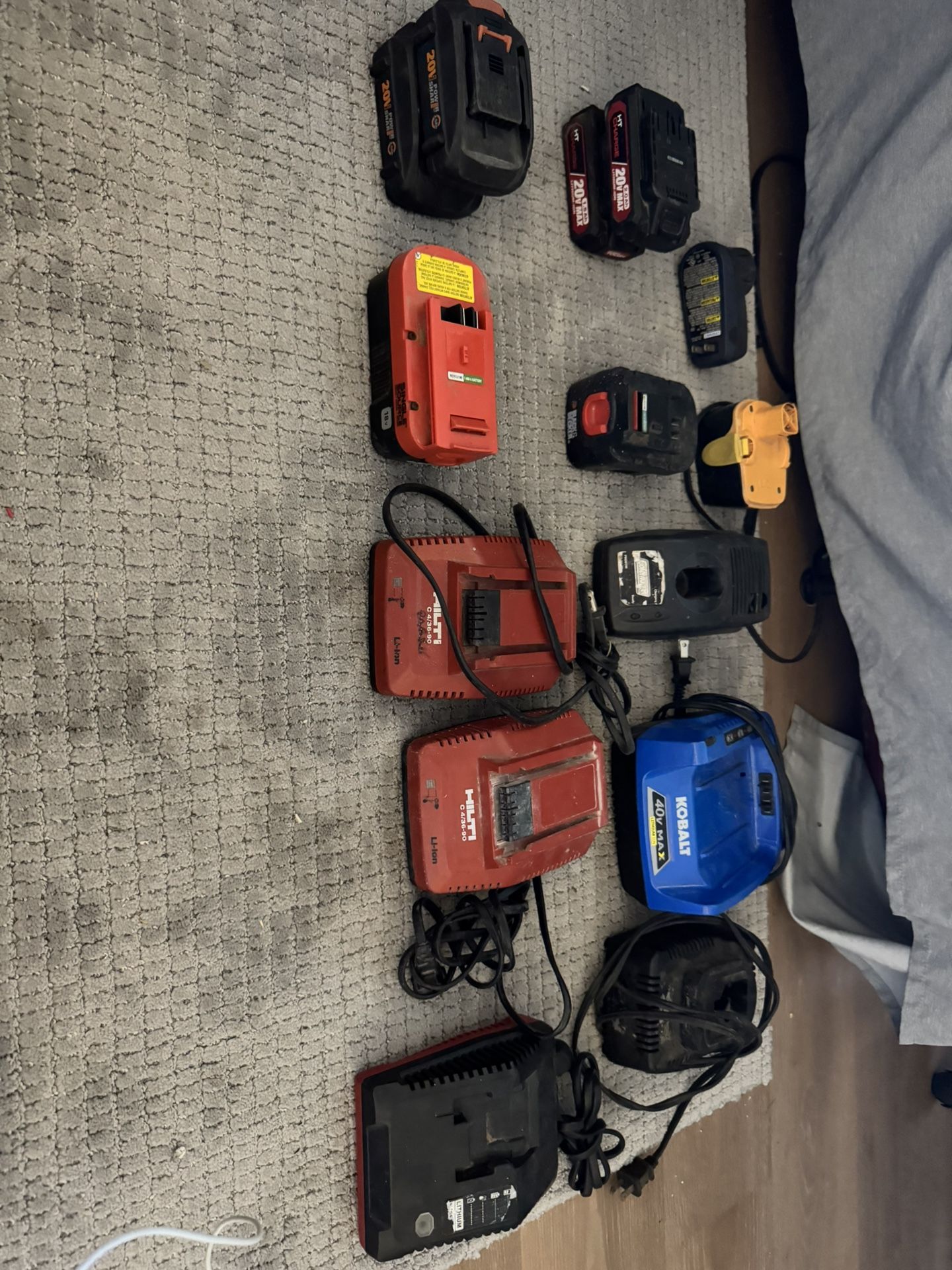 Mixture Of Batteries And Chargers