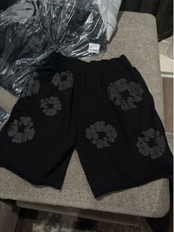 Black on black denim tear shorts