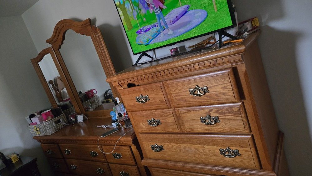 Headboard, Dresser With Mirror, And Chester.
