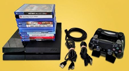 PlayStation 4 PS4 ,11 games and 2 controllers, 2 charging cords and charging cradle , power cable for console and HDMI cable