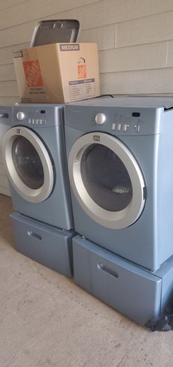 Frigidaire full size stackable washer and dryer with Pedestals!