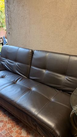 Black Faux Leather Futon Sofa Bed with Chrome Legs