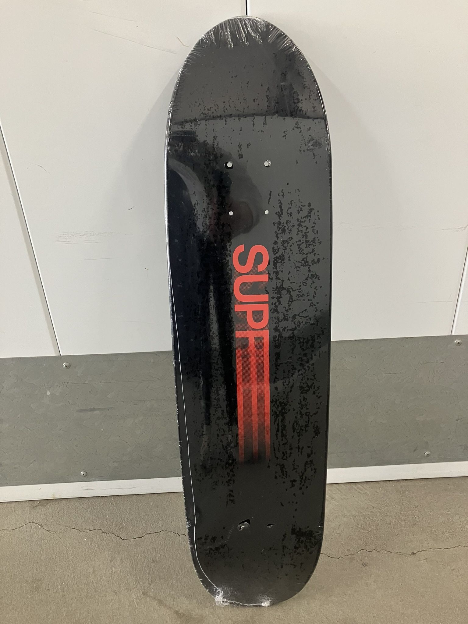 SUPREME MOTION SKATEBOARD