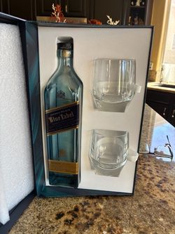 Johnny Walker display empty bottle with two rock glasses