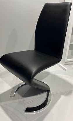 NEW.  Set of 6  - black leather and chrome base chairs