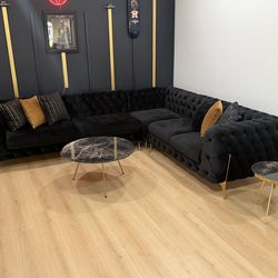Black and gold sectional w/ marble coffee table & side table