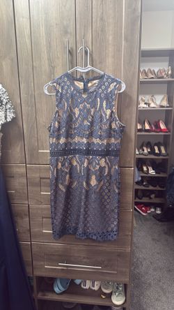 Blue lace over tan dress