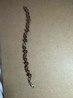 sterling silver Valerio brand piece featuring Baltic amber stones.