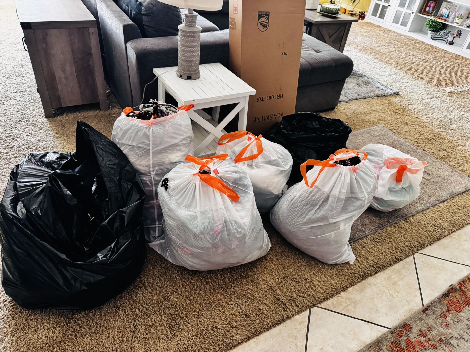 Seven bags of women in men’s clothing $75 