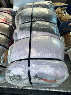 100 lbs of sweaters