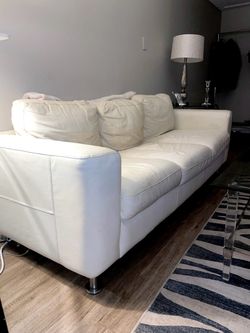 Faux leather white three seater couch