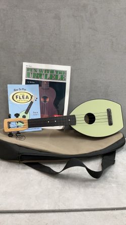 The flea ukulele with soft case