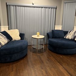 2 Swivel Couches & End Table