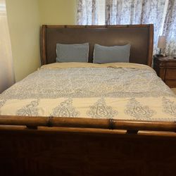 King size bed frame with large dresser with large mirror and side dresser as well