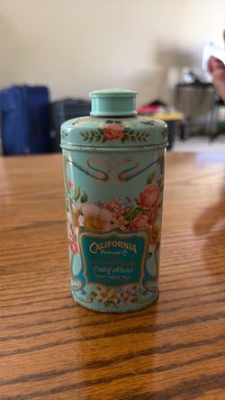 Vintage Avon talc tin