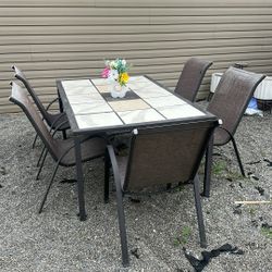 Outdoors Patio Table And Chairs 